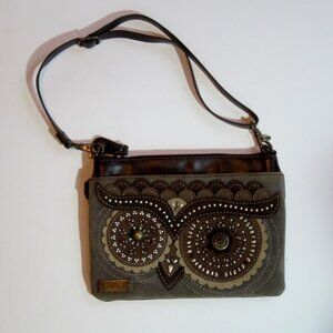 Small clutch made by Chala, with inlaid design on front